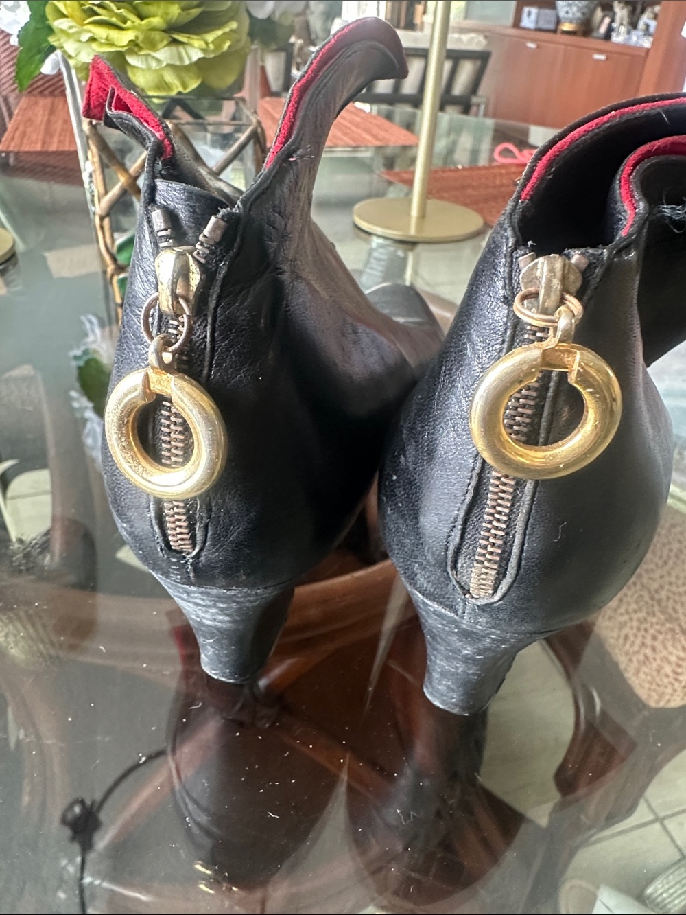 Black Leather Mid-Heel Ankle Booties with Gold Ring Zipper